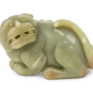 Appraisal: A Chinese Green Jade Figure of a Mythical Beast TH