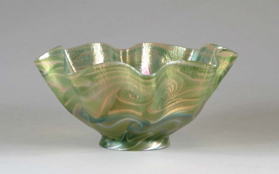 Appraisal: TIFFANY DECORATED SHADE Candlestick shade multi-shaded green ground decorated with