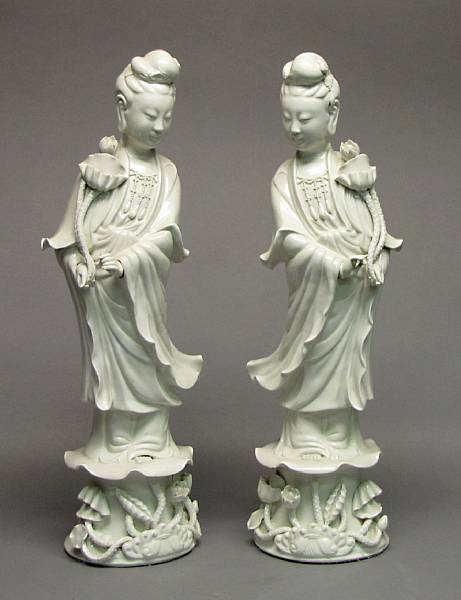 Appraisal: A pair of white glazed porcelain figures of Guanyin th