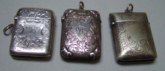 Appraisal: A silver rectangular vesta case with foliate engraved decoration Birmingham