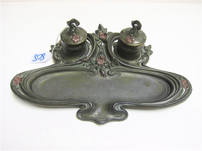 Appraisal: ART NOUVEAU METAL INK STAND having two lidded inkwells with