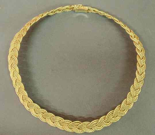 Appraisal: Gold braided choker necklace k yg marked AGA rigid form