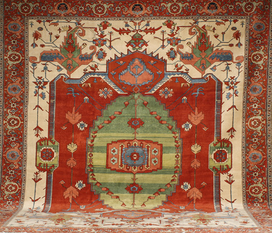 Appraisal: Serapi Rug Post Red ground with rosette field centering a