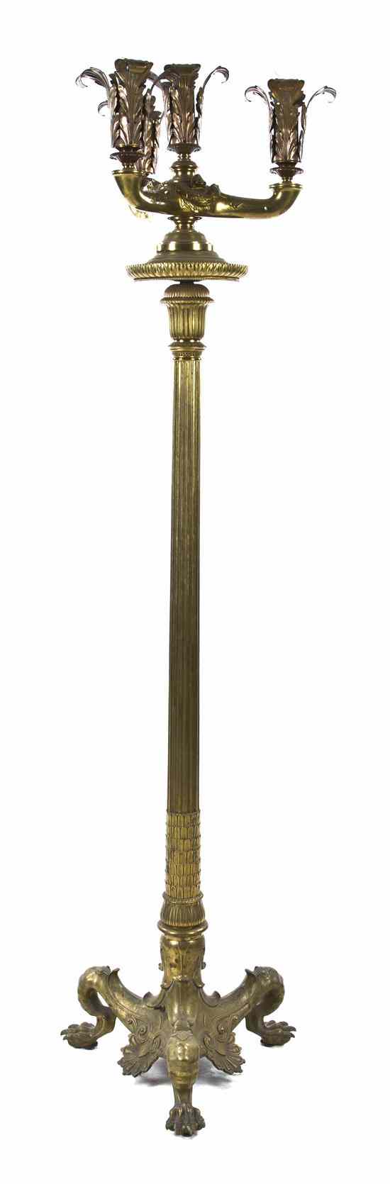 Appraisal: A Neoclassical Gilt Bronze Torchiere having four foliate cast lighting