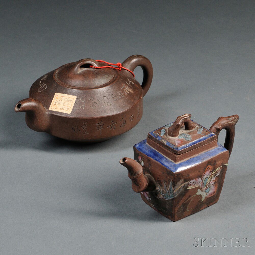 Appraisal: Two Yixing Teapots China th century the square pot painted