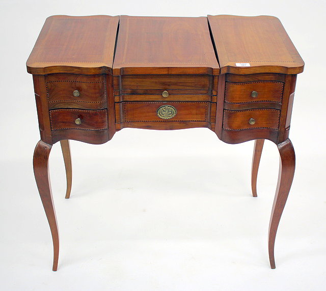 Appraisal: A FRENCH CHERRY WOOD DRESSING TABLE with decorative stringing the