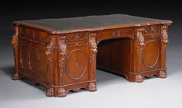 Appraisal: A George III style mahogany partner's desk in the manner