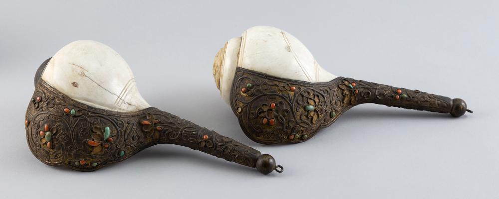 Appraisal: PAIR OF TIBETAN BUDDHIST DECORATED CONCH SHELL HORNS TH CENTURY