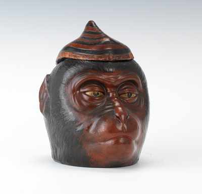 Appraisal: A Terracotta Monkey Head Tobacco Humidor Decorated terracotta monkey head