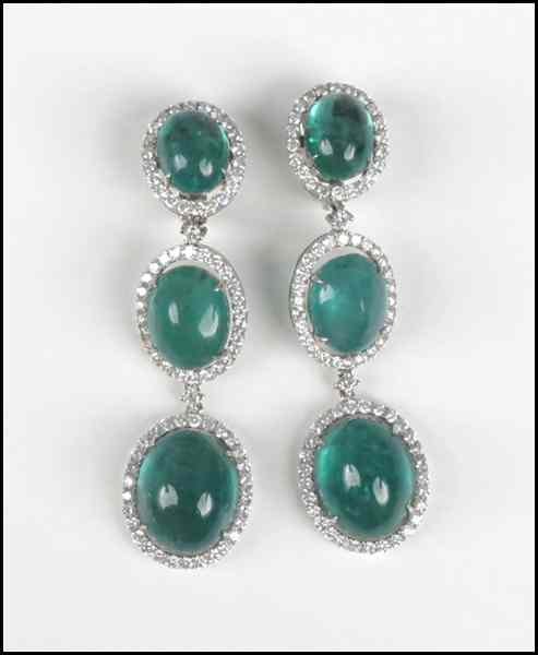 Appraisal: PAIR OF CABOCHON EMERALD DIAMOND AND KARAT WHITE GOLD EARCLIPS