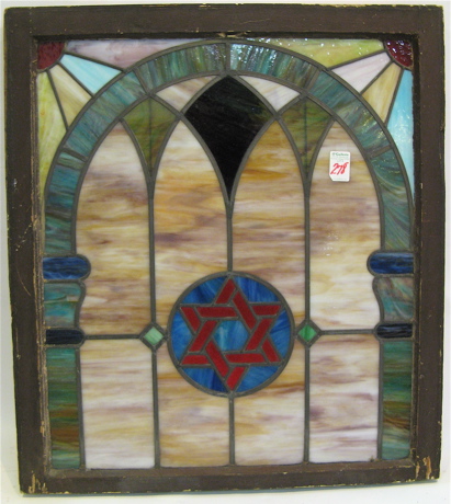 Appraisal: AN AMERICAN STAINED AND LEADED GLASS WINDOW centered with star