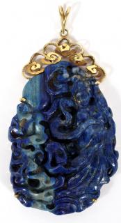 Appraisal: KT AND CARVED LAPIS LAZULI PENDANT H Width Hand carved