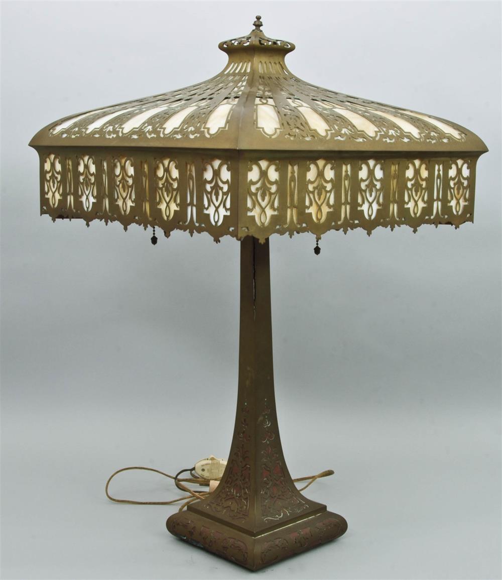 Appraisal: PIERCED BRASS AND SLAG GLASS TABLE LAMP the round pierced