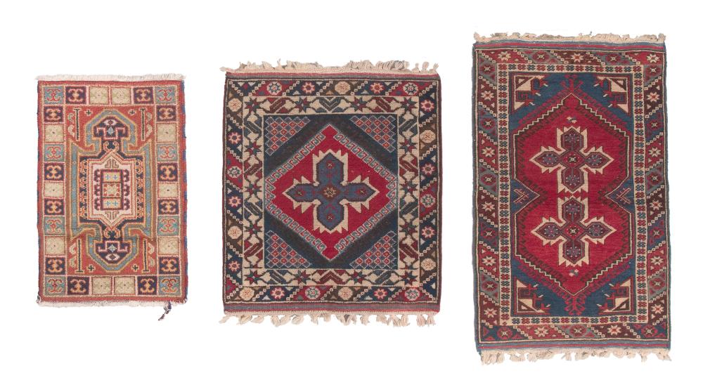 Appraisal: THREE SMALL CAUCASIAN-DESIGN TURKISH RUGS LAST QUARTER OF THE TH