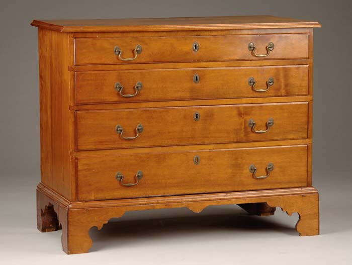 Appraisal: CHIPPENDALE FOUR DRAWER BRACKET FOOT CHEST Molded edge overhanging top