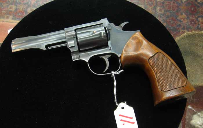 Appraisal: DAN WESSON CALIBER REVOLVER Six-shot in barrel black walnut checkered