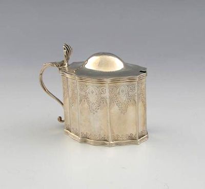 Appraisal: A George III bright engraved mustard pot with a shaped