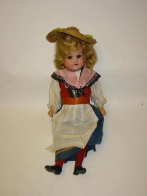 Appraisal: An Armand Marseille bisque head girl doll with fixed brown