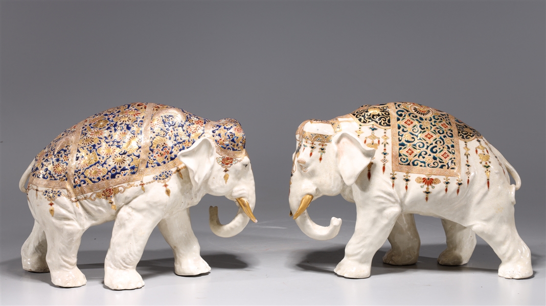 Appraisal: Pair of Chinese porcelain elephants with gilt detail possibly turn