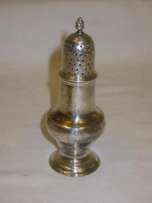 Appraisal: A GEORGE III PEPPERETTE of pear form with flame finial