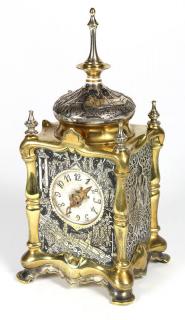 Appraisal: French Aiguilles silvered bronze clock in the Egyptian Revival taste