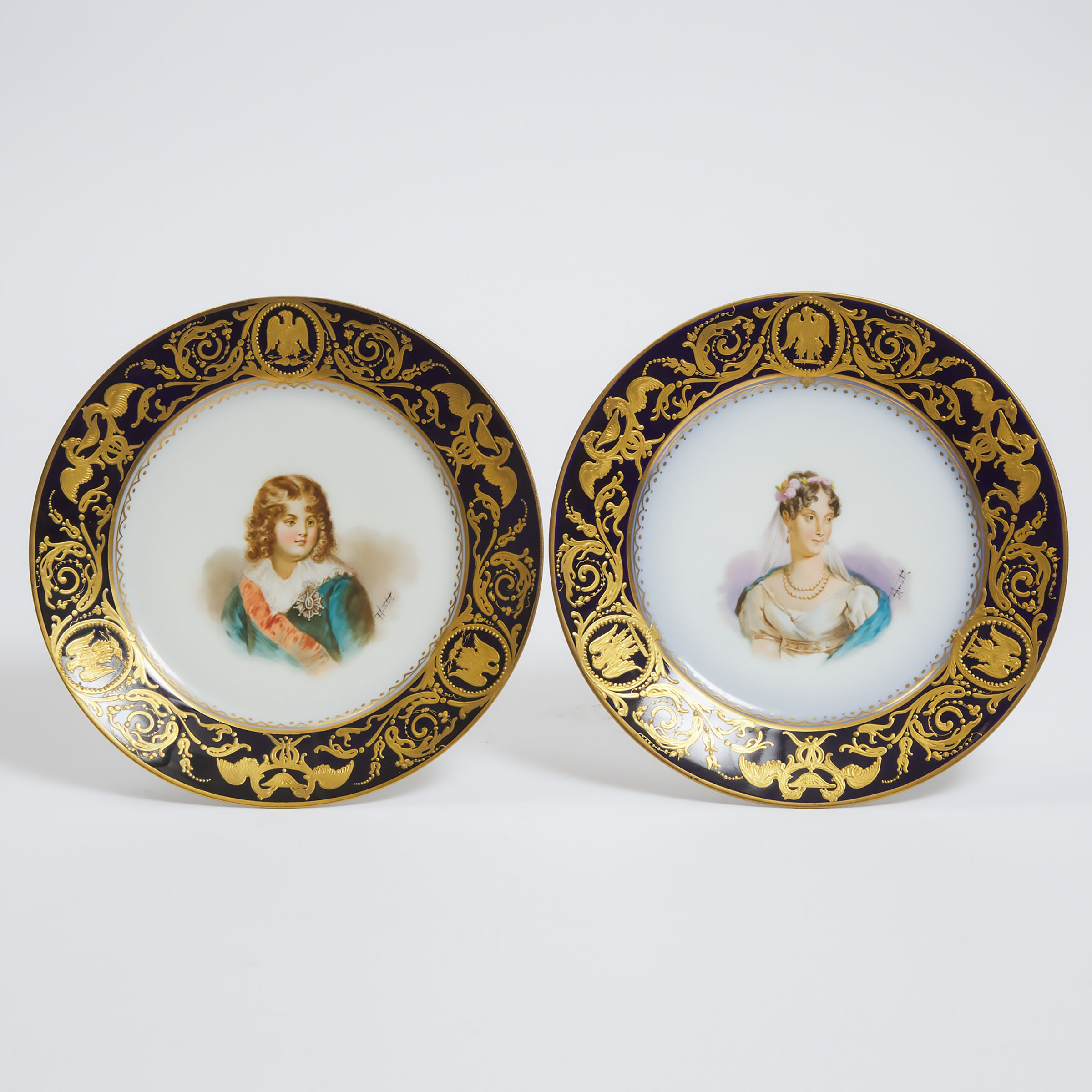 Appraisal: Pair of 'S vres' Bleu de Roi Ground Portrait Plates