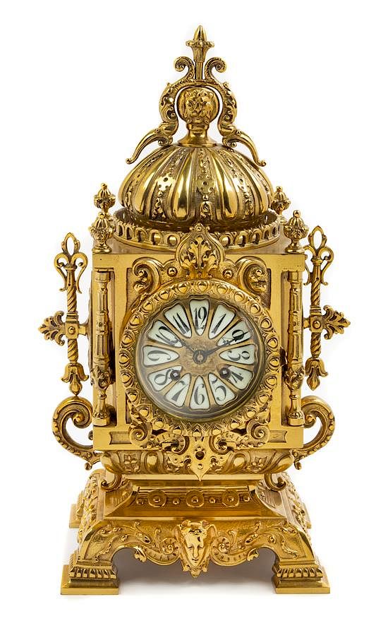 Appraisal: A Continental Neoclassical Style Brass Mantel Clock Height x width