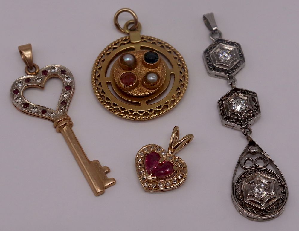 Appraisal: JEWELRY Grouping of Gold Pendants Includes a petite kt yellow