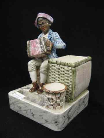 Appraisal: Victorian Figural Majolica Pottery Smoking Set depicts black man with