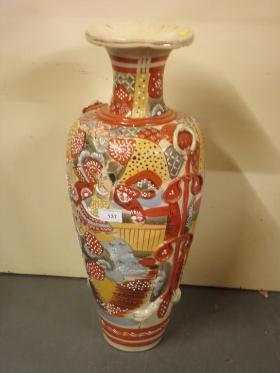 Appraisal: A Japanese earthenware vase decorated with figures within a landscape