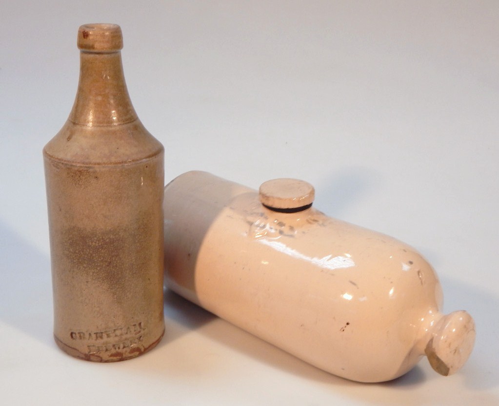 Appraisal: A Grantham brewery earthenware porter's style bottle the cylindrical body