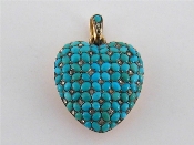 Appraisal: A mid-Victorian gold Persian turquoise and diamond heart-shaped locket circa