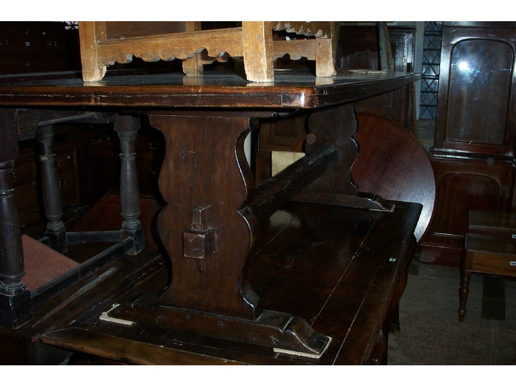 Appraisal: An Old English oak refectory table in an th century