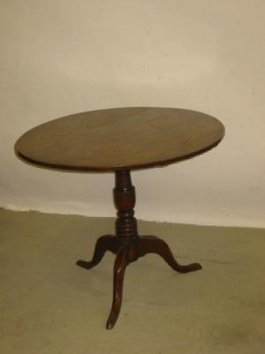 Appraisal: A GEORGE III OAK AND ELM TRIPOD TABLE the circular