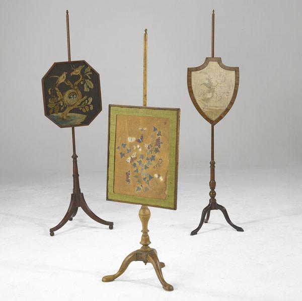 Appraisal: THREE ENGLISH SCREENS Needlework on three-footed stands late th C