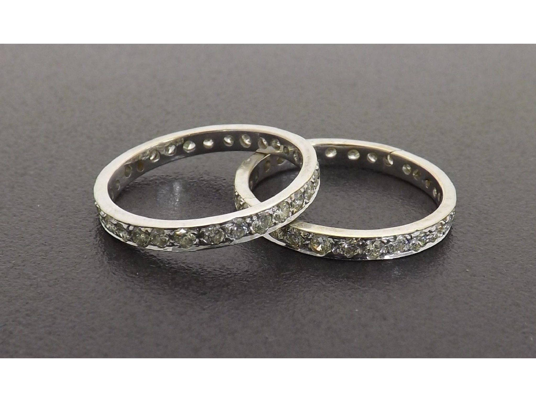 Appraisal: Two diamond set full eternity rings round brilliant-cut ring size