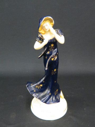 Appraisal: Figurine of a Lady in Blue Dress gold highlights deco