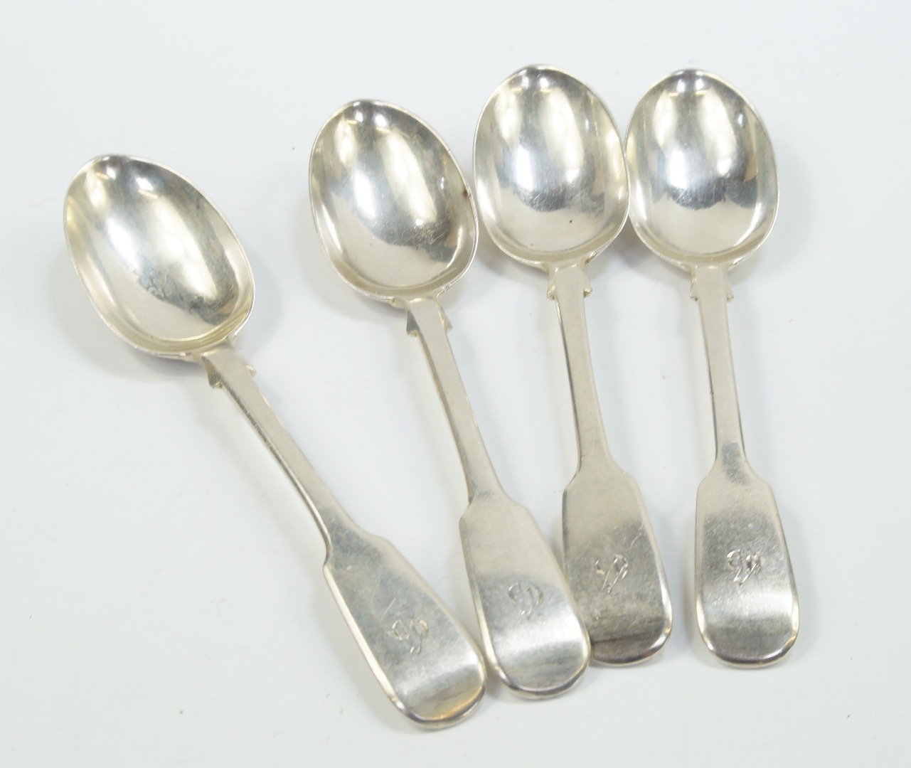 Appraisal: A set of three George III silver tablespoons decorated in