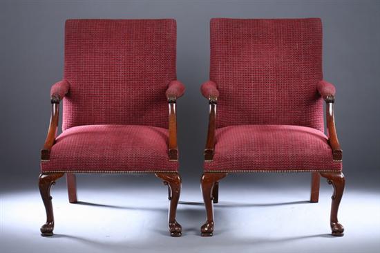 Appraisal: PAIR GEORGIAN STYLE CARVED MAHOGANY UPHOLSTERED ARM CHAIRS th century