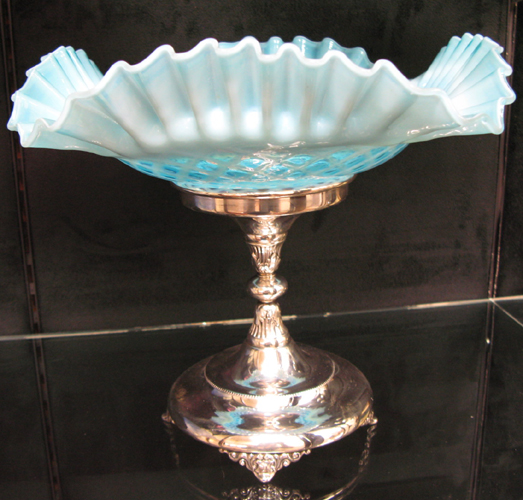 Appraisal: AN AMERICAN VICTORIAN BLUE OPALESCENT BRIDE'S BASKET The bowl with