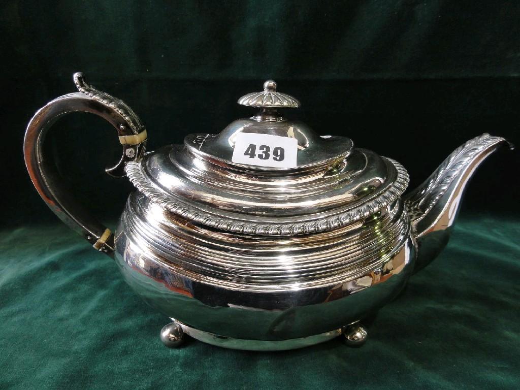 Appraisal: A Victorian silver teapot of baluster form with gadroon borders