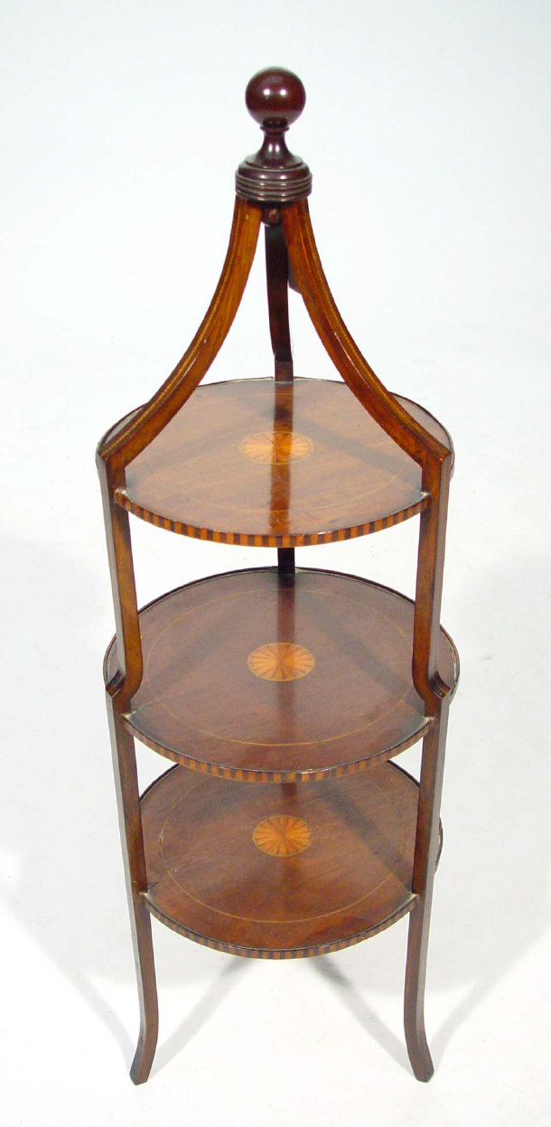 Appraisal: Edwardian inlaid mahogany three tier cake stand with turned finial