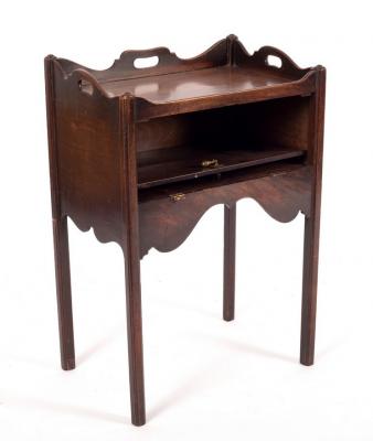 Appraisal: A George III mahogany tray top pot cupboard with hinged