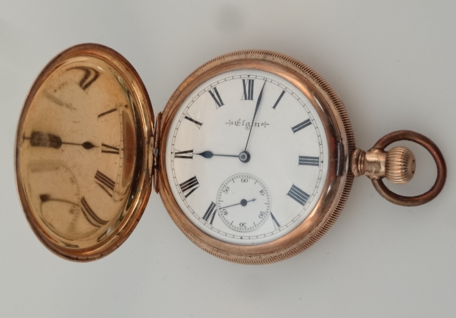 Appraisal: An early thC Elgin gold plated hunter pocket watch the