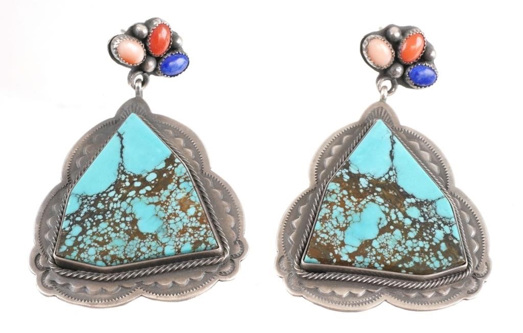 Appraisal: NAVAJO STERLING SILVER TURQUOISE EARRINGSPair of sterling earrings set with