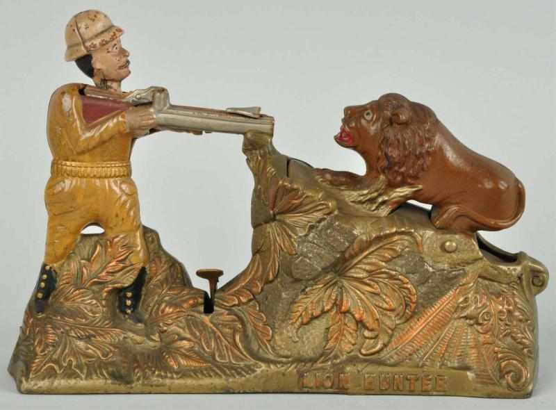 Appraisal: Cast Iron Lion Hunter Mechanical Bank Description Manufactured by J