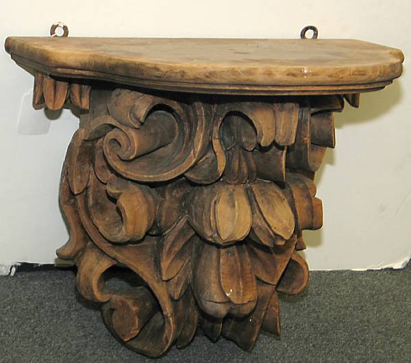 Appraisal: A Baroque style carved hardwood bracket th century The demilune