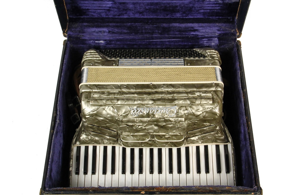 Appraisal: QUALITY ACCORDIAN - Crucianelli Pancordian in pearl grey key made