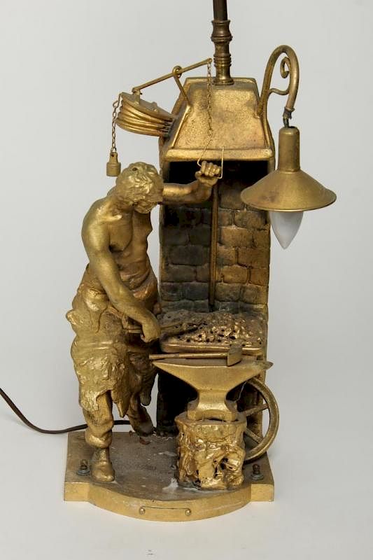 Appraisal: After Rousseau French Gilt Metal Blacksmith Lamp French gilt-painted spelter