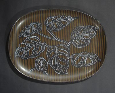 Appraisal: Philodendron' a trial Poole Pottery Studio plate by Ann Read